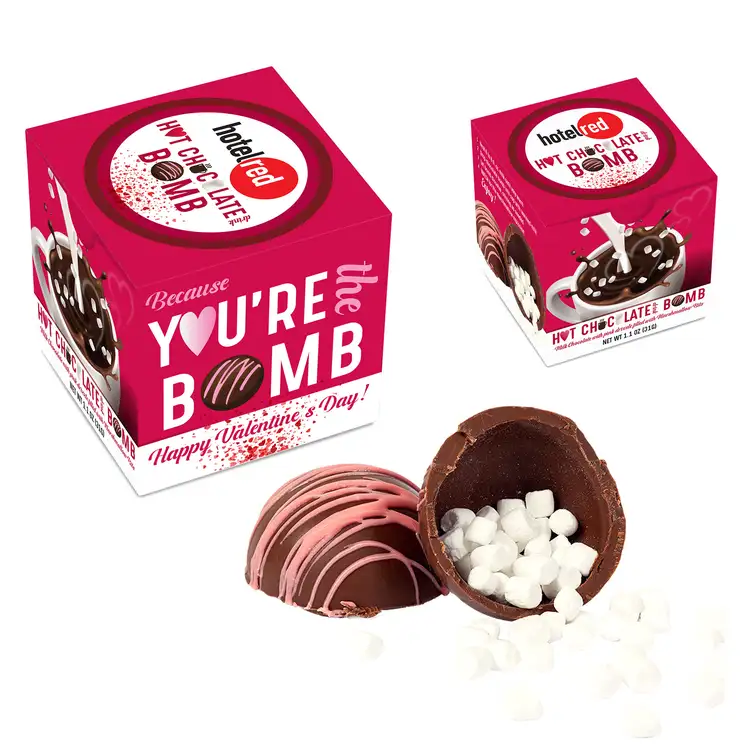 Hot chocolate bomb with pink drizzle