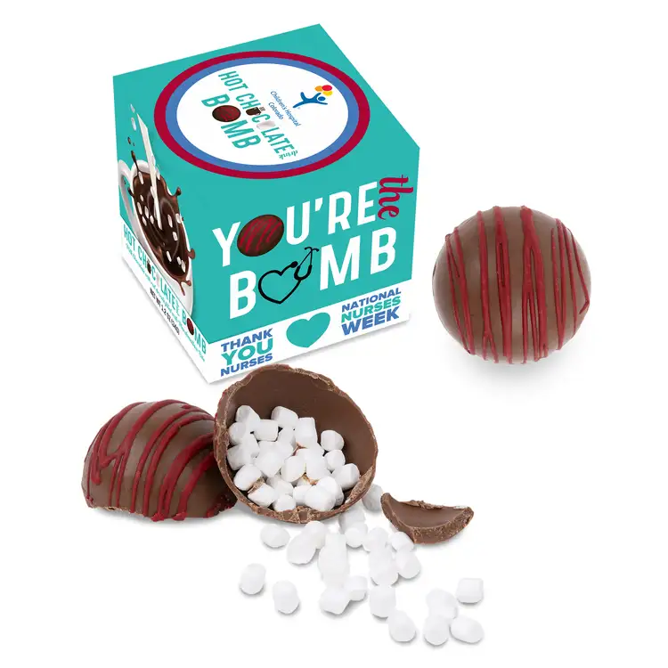 Hot chocolate bomb with red drizzle