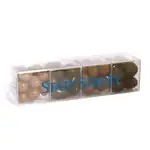 Coffret de quatre cubes de collations enrobées de chocolat