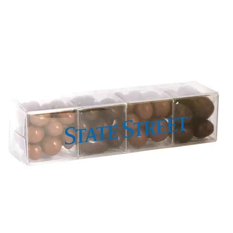 Coffret de quatre cubes de collations enrobées de chocolat