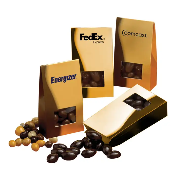 Petite boîte dorée de gourmandises chocolatées